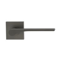 The image shows the Griffwerk door handle set LEAF LIGHT in the version with rose set square unlockable screw on cashmere grey