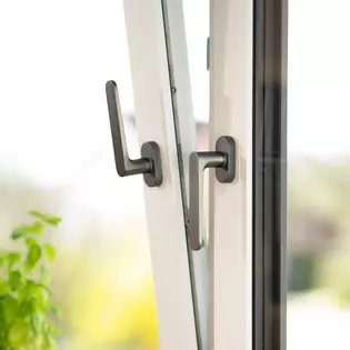Griffwerk window handle Avus cashmere gray Griffwerk window handle Avus in cashmere gray on tilted window