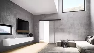 Abbildung Planeo Air von Griffwerk in Wohnzimmer Die Abbildung zeigt die Schiebetür Planeo Air von Griffwerk in einem Wohnzimmer im Bauhausstil.