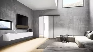 Abbildung Planeo Air von Griffwerk in Wohnzimmer Die Abbildung zeigt die Schiebetür Planeo Air von Griffwerk in einem Wohnzimmer im Bauhausstil.