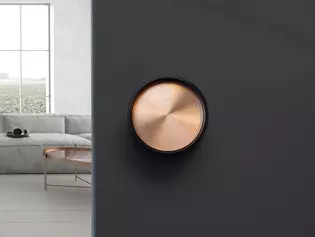 Griffwerk PLANEO handle shell in graphite black with copper inlay Living room with handle PLANEO in graphite black with copper inlay on black door