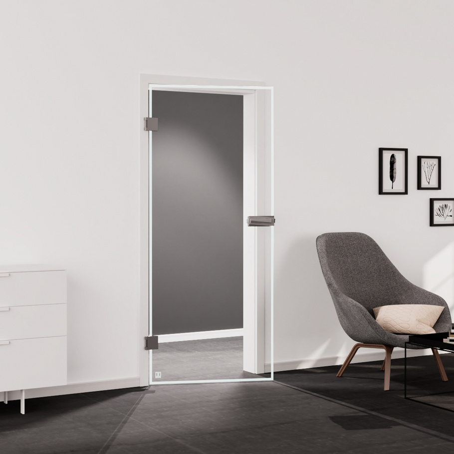 Living situation which shows the glass door with tempered safety glass (ESG) laserdecor JETTE FRAME 815 in the vision clear BASIC GREEN drilling Studio/Office revolving door DIN L