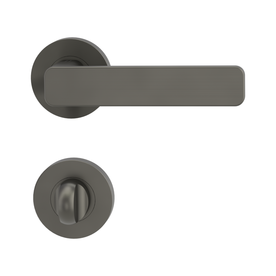 Freigestelltes Produktbild im idealen Blickwinkel fotografiert zeigt die GRIFFWERK Rosettengarnitur AVUS in der Ausführung WC-Schließer - Graphitschwarz - Flachrosette Innenansicht 