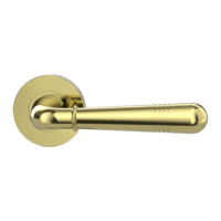 The image shows the Griffwerk door handle set FABIA in the version with rose set round unlockable screw on brass look