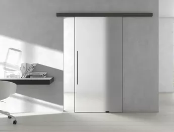 The PLANEO AIR sliding door system, with its sleek frame profile, creates an emblematic graphic effect.