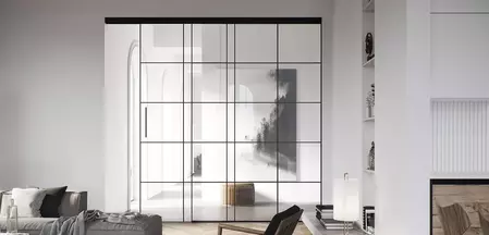 La ferrure de porte coulissante Planeo Air cite les cadres en fer typiques du style loft, mais parle un langage beaucoup plus minimaliste et silencieux. 