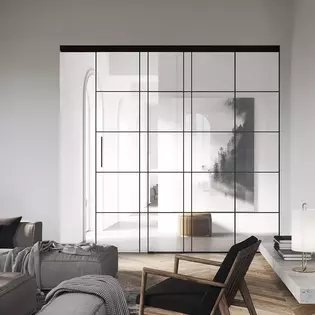 Los herrajes para puertas correderas Planeo Air citan los típicos marcos de hierro del estilo loft, pero hablan un lenguaje mucho más minimalista y tranquilo. 