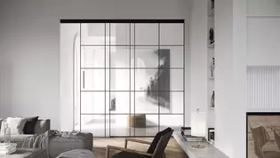 PLANEO LOFT en situación de salón Los herrajes para puertas correderas Planeo Air citan los típicos marcos de hierro del estilo loft, pero hablan un lenguaje mucho más minimalista y tranquilo.
