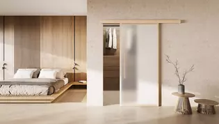 Schiebetürsystem Planeo X Holz Die Abbildung zeigt ein Wohnbild mit der montierten Schiebtür Planeo X in Holz.