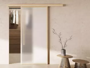 Schiebetürsystem Planeo X Holz Die Abbildung zeigt ein Wohnbild mit der montierten Schiebtür Planeo X in Holz.