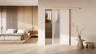 Schiebetürsystem Planeo X Holz Die Abbildung zeigt ein Wohnbild mit der montierten Schiebtür Planeo X in Holz.