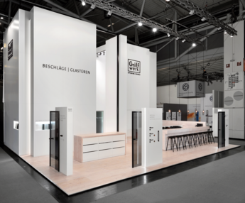 GRIFFWERK trade fair stand at BAU 2017 impresses once again with seven meters height. GRIFFWERK offers their expertise for fittings and interior glass doors.