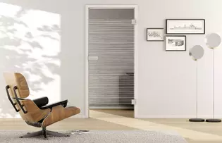 Living situation with shows the GRIFFWERK glass door Lines_LD_605 laser one side in the version revolving door - DIN right - studio / office - tempered safety glass PURE WHITE 