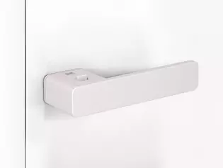 Door handles One White The picture shows the mounted Door handle One in White on a white door.