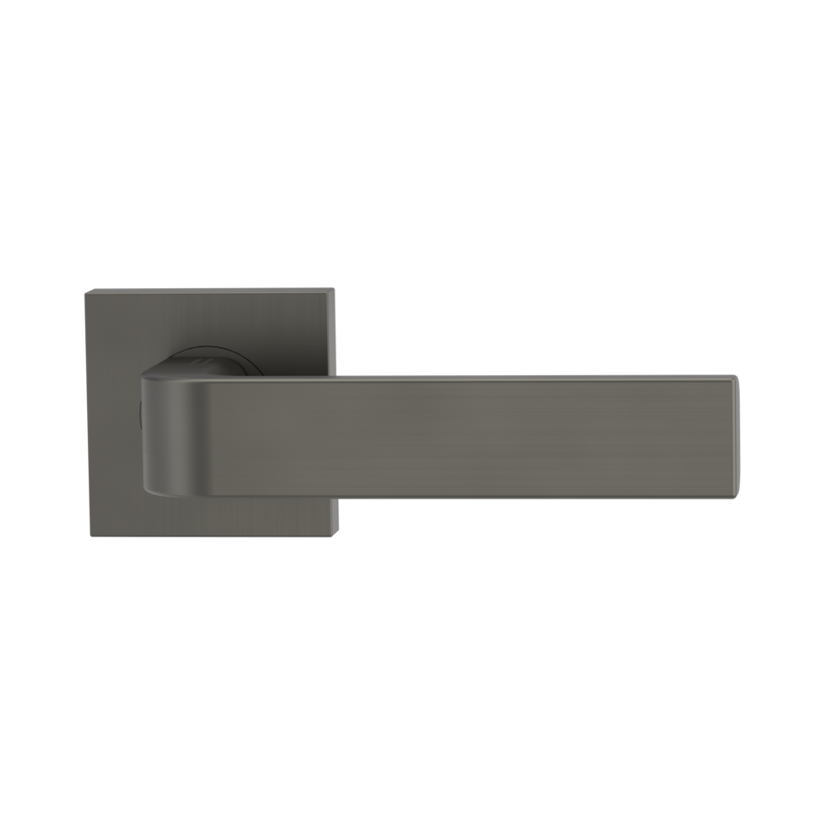 The image shows the Griffwerk door handle set GRAPH in the version with rose set square unlockable screw on cashmere grey