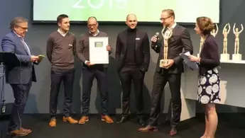 Abbildung zeigt die Preisverleihung des Woody-Award im Rahmen des Branchentags in Köln