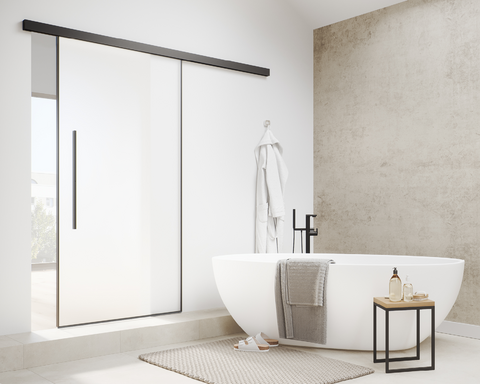 The picture stage shows a bathroom with the Griffwerk sliding door Planeo Air Silent