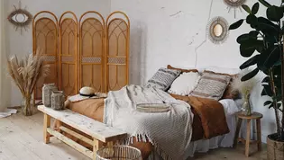 Die Abbildung zeigt ein Schlafzimmer mit Einrichtung im Boho Style.