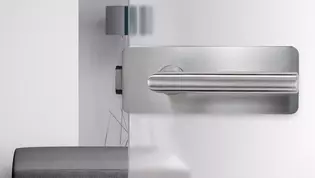 Ilustración de la situación de la vivienda Caja de cerradura GRIFFWERK Puerta La ilustración muestra una situación de sala de estar con la Caja de cerradura GATE de Griffwerk.