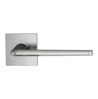 The image shows the Griffwerk door handle set REMOTE in the version with rose set square unlockable screw on velvety grey