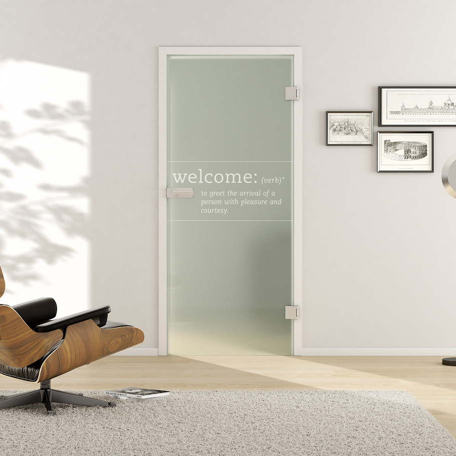 Ambient image in living situation illustrates the Griffwerk Glass revolving door TYPO 667 in the version TSG BASIC GREEN matt
