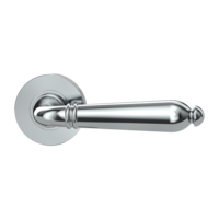 The image shows the Griffwerk door handle set CAROLA in the version with rose set round unlockable screw on chrome