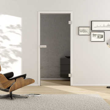 Wohnsituation mit zeigt die GRIFFWERK Klarglastür SMOKED GREY_510 in der Ausführung - Drehtür - Bohrung Studio/Office - DIN rechts - Einscheibensicherheitsglas (ESG) MOON GREY