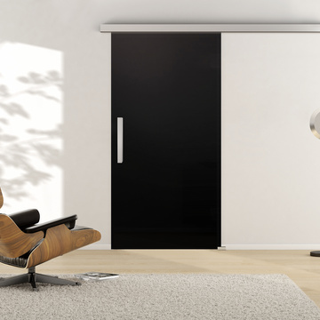 Ambientebild in Wohnraumsituation illustriert die Griffwerk Glasschiebetür PIANO BLACK in der Ausführung VSG PURE WHITE schwarz blickdicht