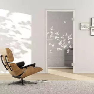 Living situation with shows the GRIFFWERK glass door BIRDS & BIRD_LD_695 laser one side in the version revolving door - DIN right - studio/office - tempered safety glass PURE WHITE
