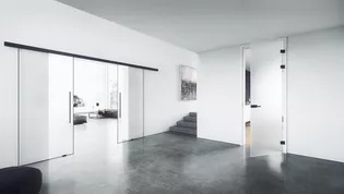 Glass door system PLANEO AIR PLANEO AIR glass door system by GRIFFWERK is now also available as a double-leaf version.