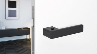 Living situation image Griffwerk door handle R8 One The image shows the Griffwerk door handle R8 One with a living room.