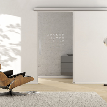 Ambient image in living situation illustrates the Griffwerk sliding glass door TYPO 689 in the version TSG PURE WHITE clear