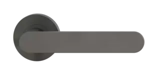 The image shows the Griffwerk door handle set AVUS in the version with rose set round unlockable screw on cashmere grey