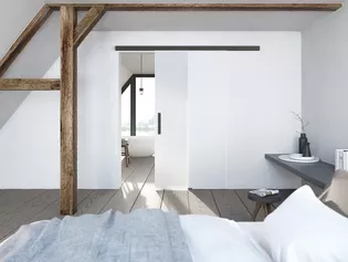 Griffwerk Planeo X Gris cachemire L'illustration montre une pièce d'habitation avec une porte coulissante encastrée et le Système de portes coulissantes Planeo X de Griffwerk en gris cachemire.