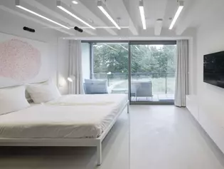 Die Abbildung zeigt das Schlafzimmer vom Konzeptapartment VOID.