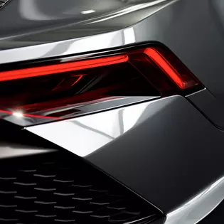 Elegancia radiante: toma de detalle del piloto trasero combinado del Audi R8 enfocado.