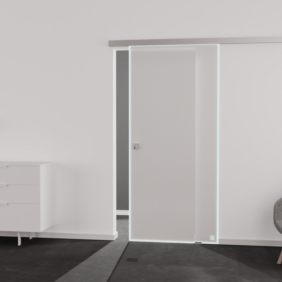 Living situation which shows the glass door with tempered safety glass (ESG) laserdecor JETTE FRAME 815 in the vision frosted BASIC GREEN drilling Studio/Office sliding door