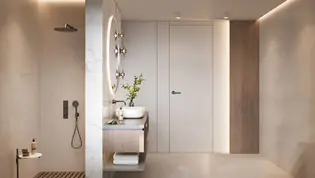 Die Abbildung zeigt ein Badezimmer mit Türgriff LUCIA fast2fix in Kaschmirgrau