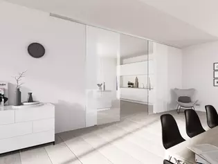 Wohnraumbild Griffwerk Glasschiebetür Planeo Die Abbildung zeigt die Griffwerk Glasschiebetür Planeo in einem Wohnraum.