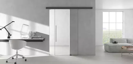 La ilustración muestra una sala de estar con el Sistema de puertas correderas PLANEO AIR de Griffwerk.