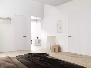 The picture shows a bedroom with a view of the open bathroom, the doors in this room are equipped with the door handle R8 ONE smart2lock in cashmere gray.