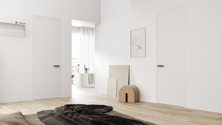 Abbildung eines Schlafzimmers mit R8 ONE smart2lock Die Abbildung zeigt ein Schlafzimmer mit blick ins offene Bad, die Türen in diesem Raum sind mit dem Türgriff R8 ONE smart2lock in Kaschmirgrau ausgestattet.