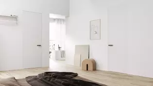 L'illustration montre une chambre à coucher avec vue sur la salle de bain ouverte, les portes de cette pièce sont équipées de poignées de porte R8 ONE smart2lock en Gris cachemire.